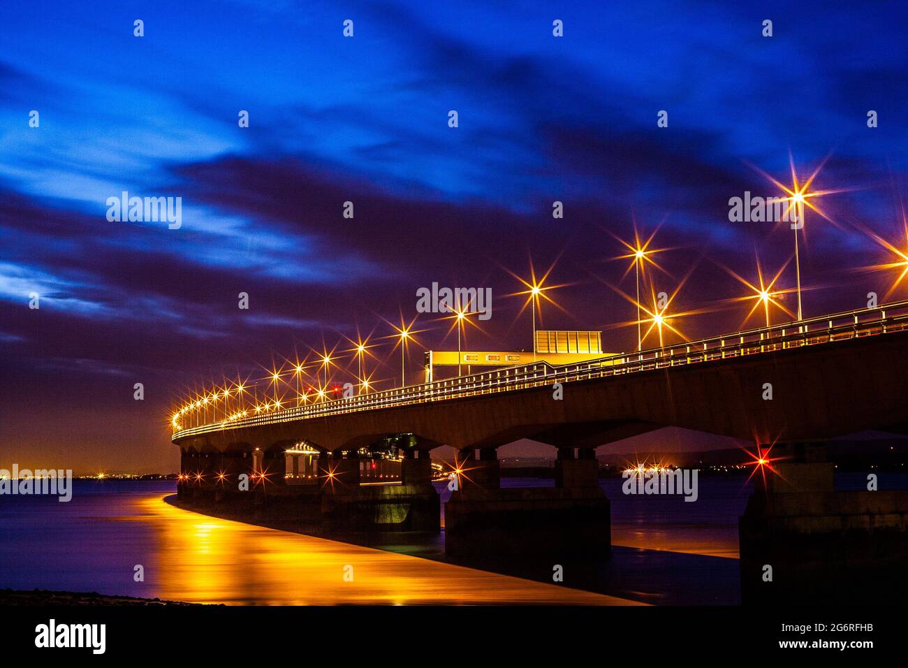The Severn road bridge, crossing from England to Wales in the UK, shot just after sunset Stock Photo
