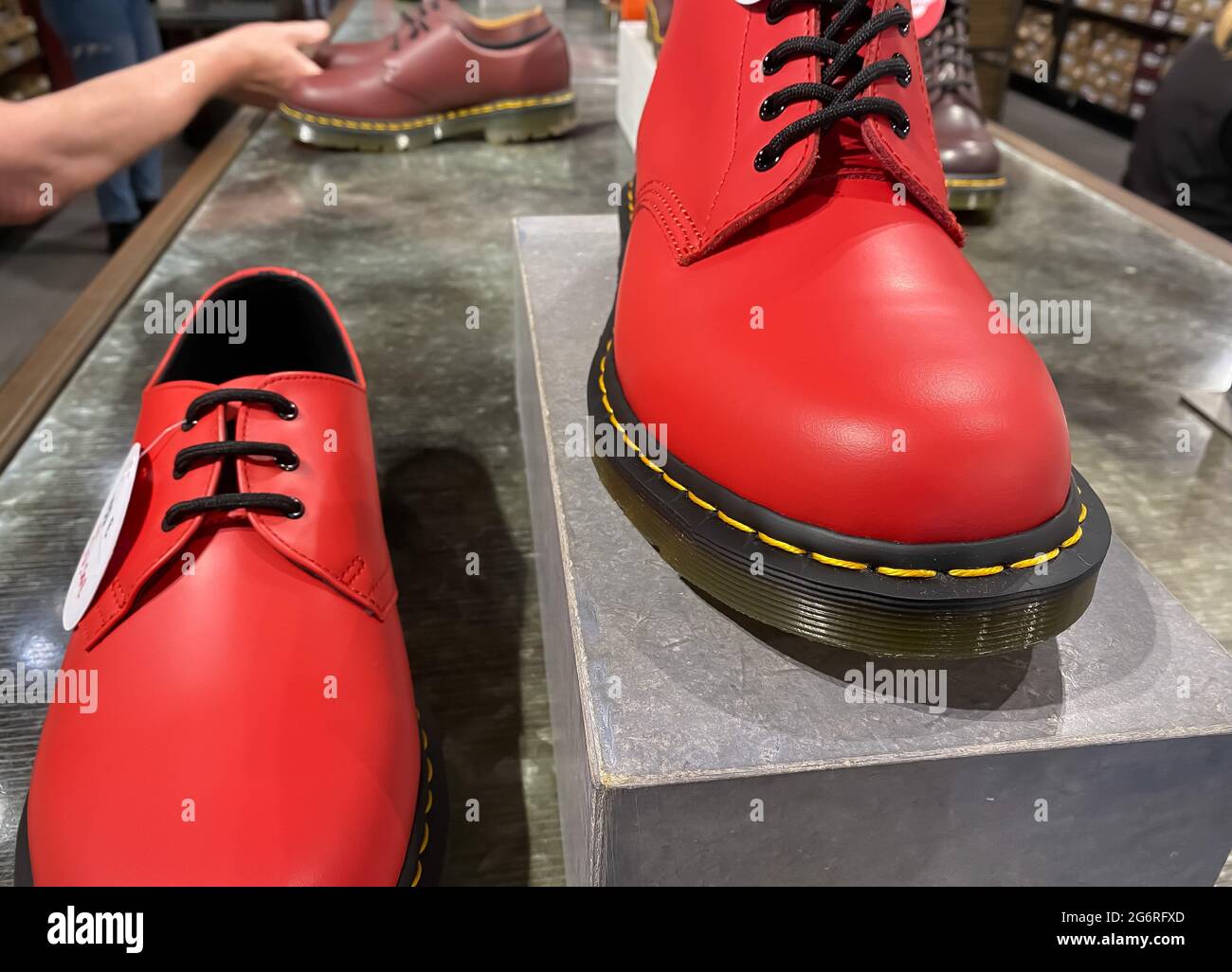 Roermond, Netherlands - July 1. 2021: Closeup of red boots in dr martens  store Stock Photo - Alamy