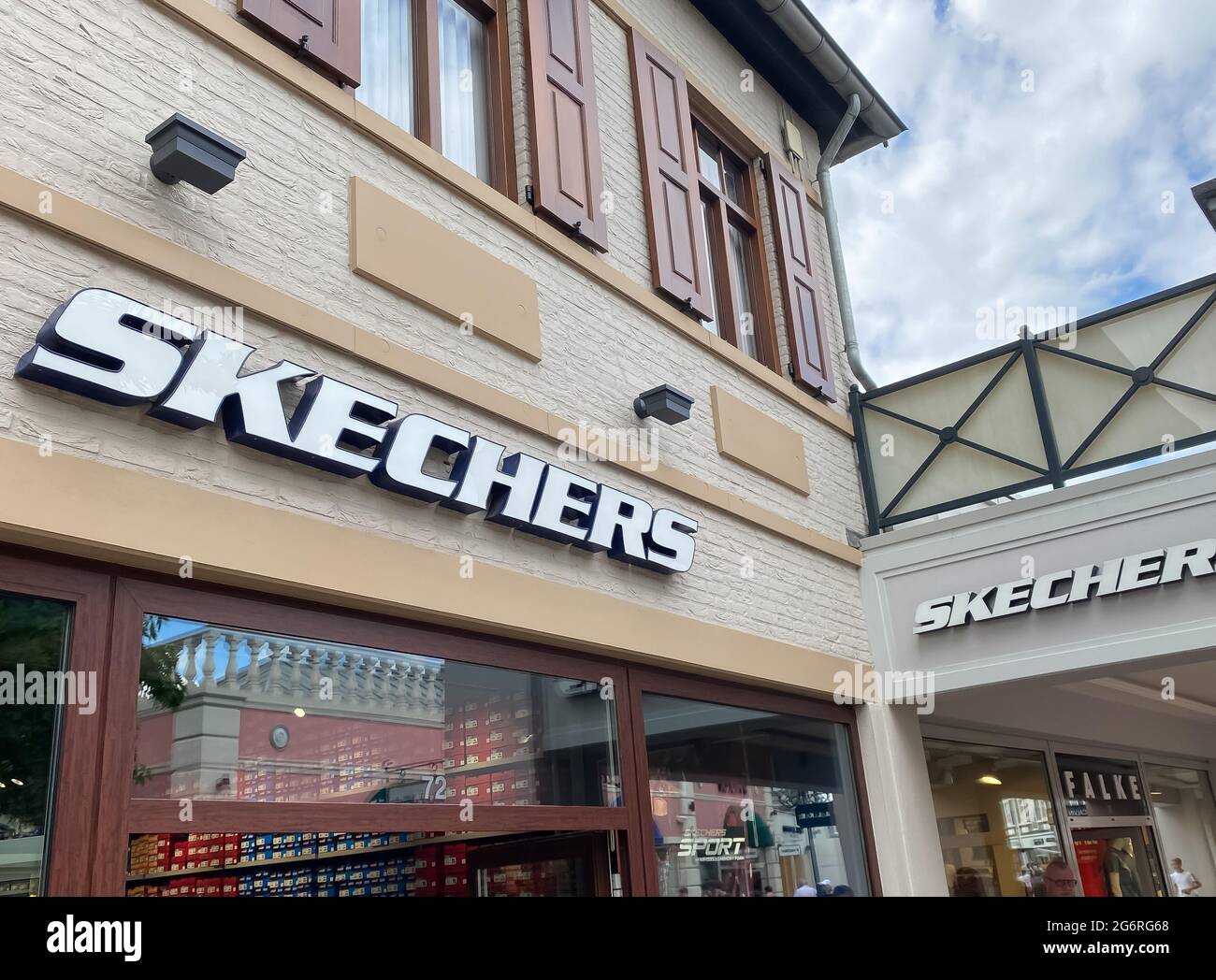 Roermond, Netherlands - July 1. 2021: View on store facade with logo  lettering of skechers sneakers fashion (focus on right part of left  lettering Stock Photo - Alamy