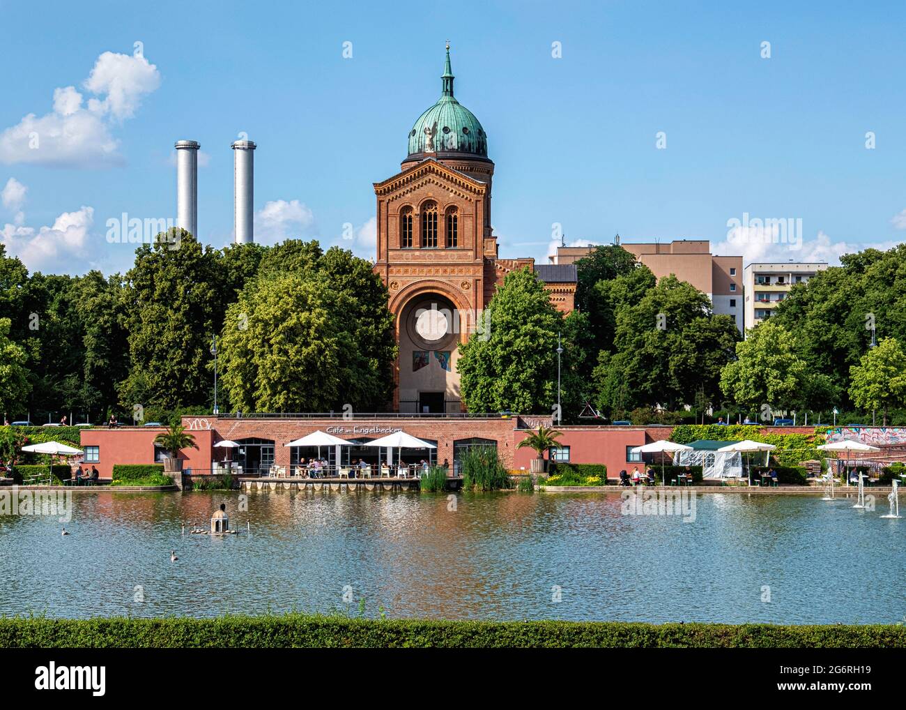 The Engelbecken (Angel’s Pool), with waterside cafe, & St. Michael’s church on the Mitte-Kreuzberg border in Berlin,Germany Stock Photo