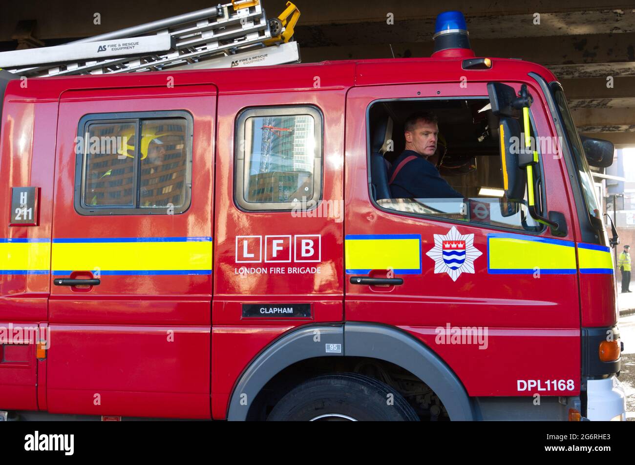 London Fire Brigade Fire Engine with Crew Stock Photo - Alamy