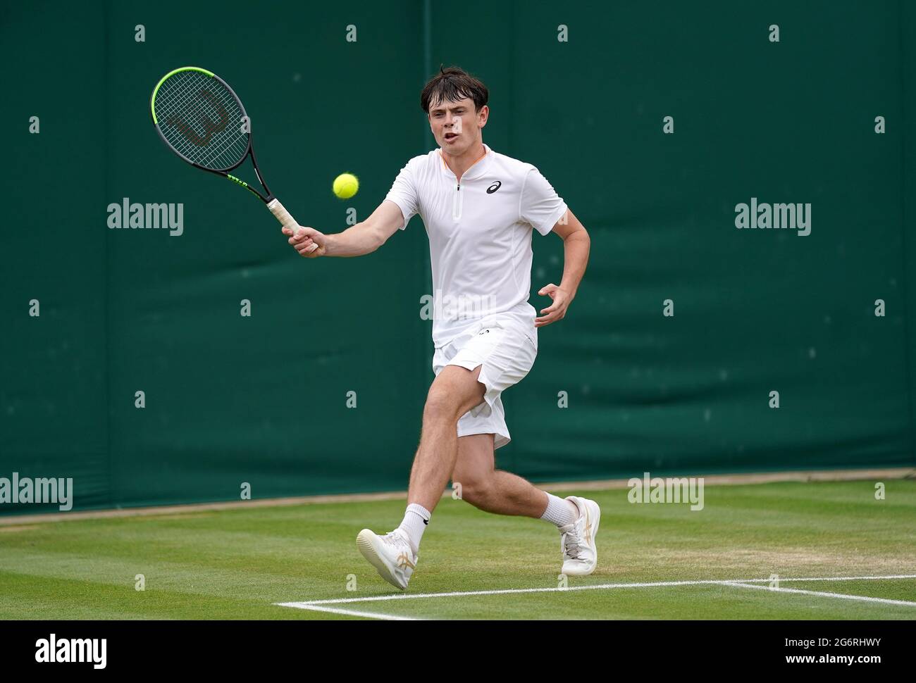 Jack Pinnington Jones in action against Joao Victor Couto Loureiro during  their boys' singles second round match on day ten of Wimbledon at The All  England Lawn Tennis and Croquet Club, Wimbledon.