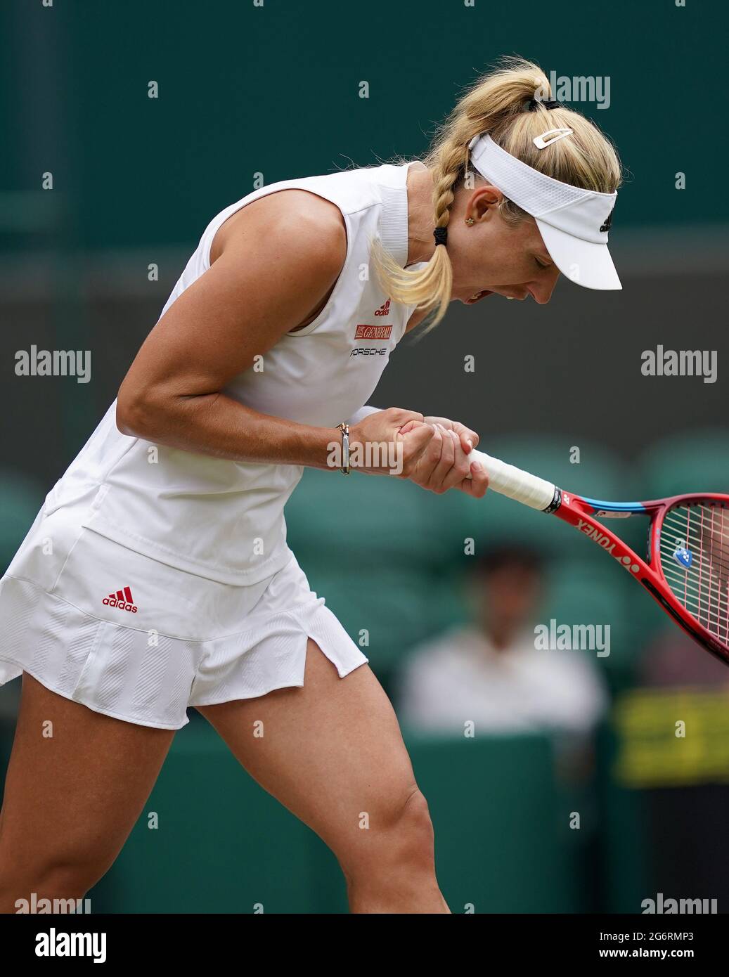 Angelique Kerber celebrates winning a service game against Ashleigh Barty in their ladies' singles semi-final match on day ten of Wimbledon at The All England Lawn Tennis and Croquet Club, Wimbledon. Picture date: Thursday July 8, 2021. Stock Photo