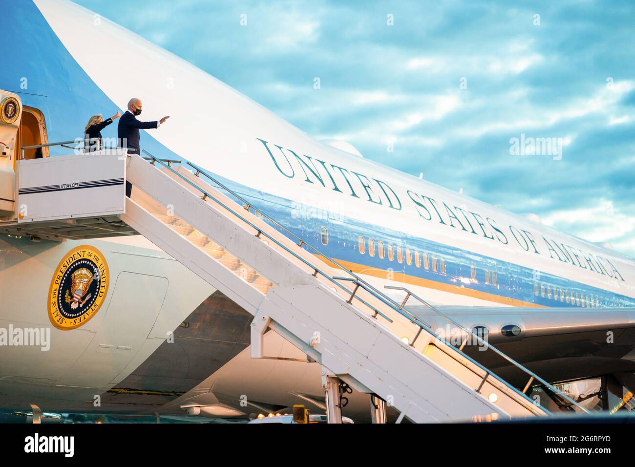 Washington, USA. 09th June, 2021. President Joe Biden and First Lady Jill Biden wave as they board Air Force One at Royal Air Force Mildenhall, England on Wednesday, June 9, 2021, en route to Cornwall Airport Newquay, England. (Official White House Photo by Adam Schultz via Credit: Sipa USA/Alamy Live News Stock Photo