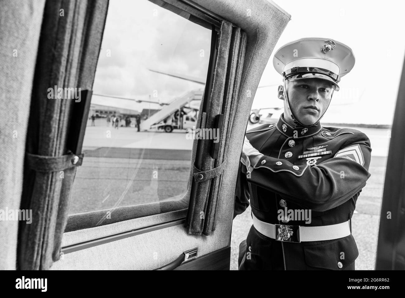 Washington, USA. 04th June, 2021. A U.S. Marine holds the door to Nighthawk-2 open at Dover Air Force Base in Dover, Delaware on Friday, June 4, 2021, before President Joe Biden and First Lady Jill Biden board Air Force One en route to Joint Base Andrews, Maryland. (Official White House Photo by Adam Schultz via Credit: Sipa USA/Alamy Live News Stock Photo
