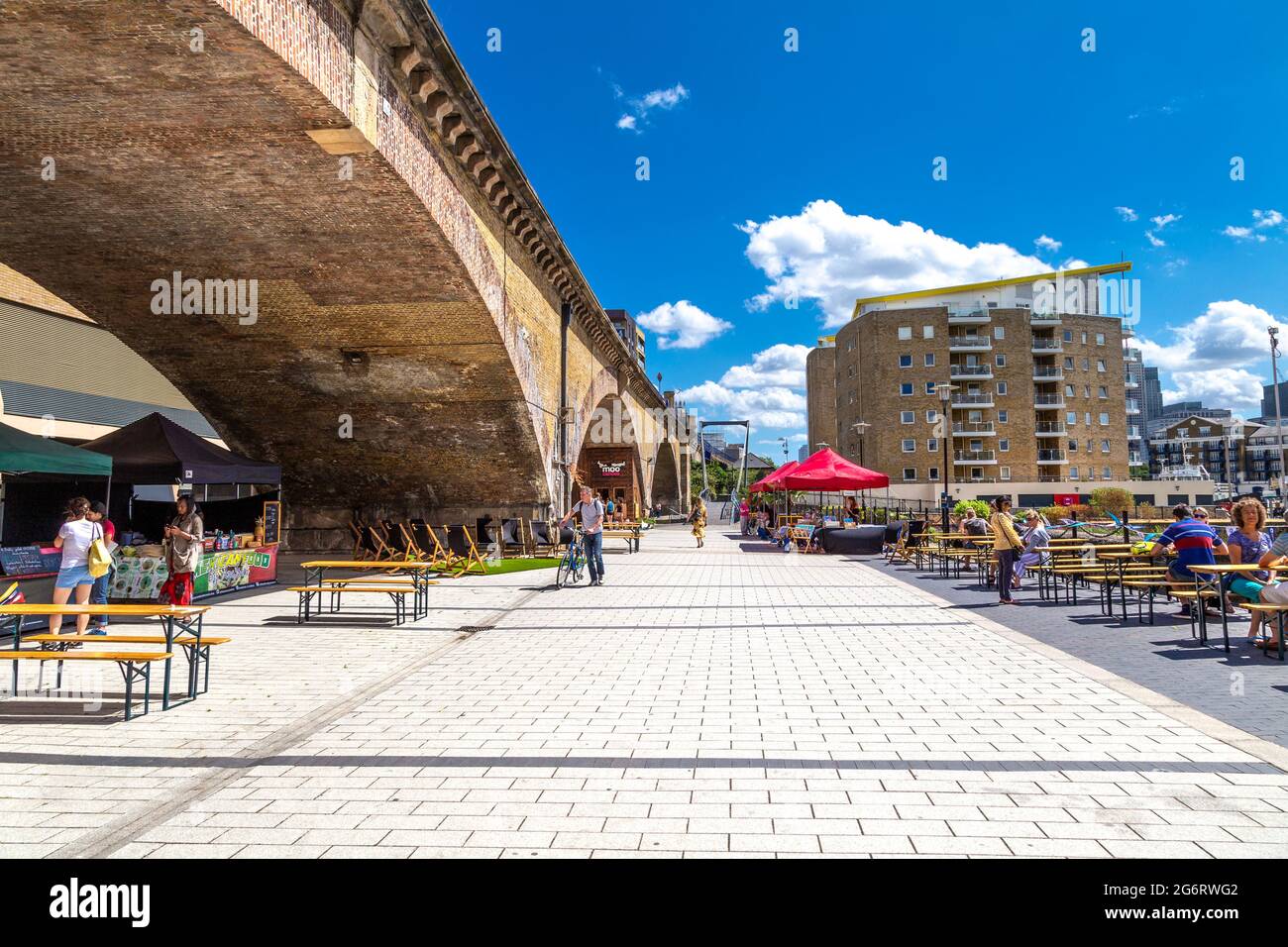 DLR railway arches overlooking the Limehouse Basin, Limehouse Market, London, UK Stock Photo