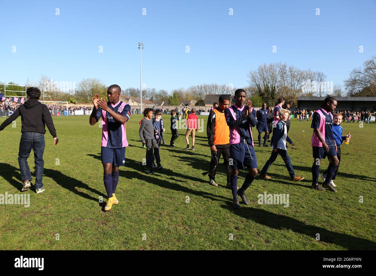 Dulwich Hamlet footballers applaud the supporters at Dulwich Hamlet's match against Maidstone FC , their final home game of the 2014/2015 season. Stock Photo