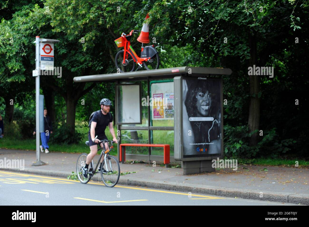 London, UK. 8th July, 2021. Lime rental Bike left on bus stand at Wandsworth Common after night of Euro football win celebrations after England beat Denmark at Wembley. Credit: JOHNNY ARMSTEAD/Alamy Live News Stock Photo