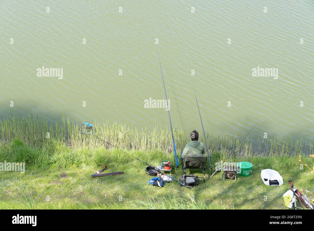 Fisherman fishing rod chair hi-res stock photography and images - Alamy