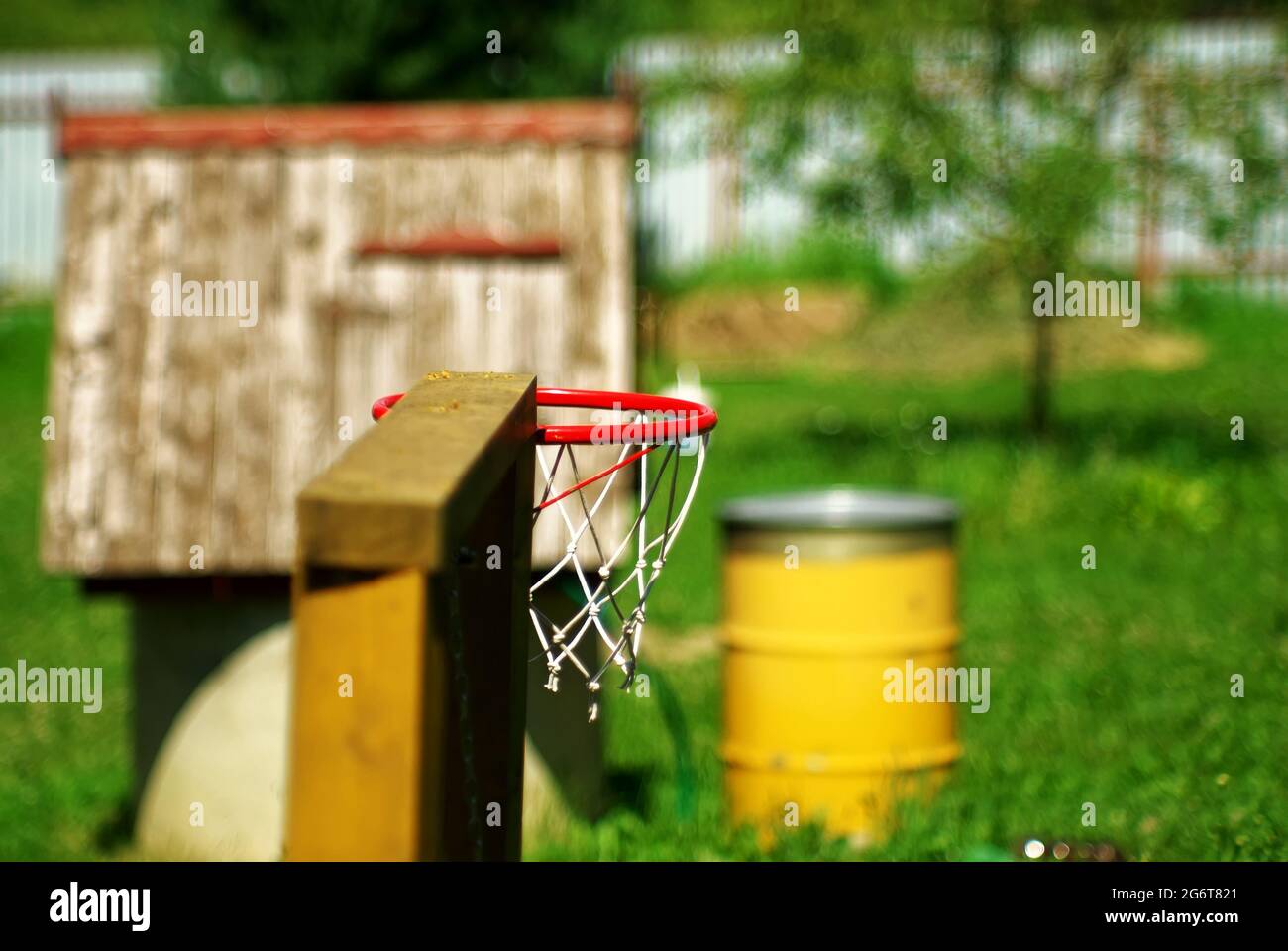 basketball hoop near the village house, in the summer Stock Photo Alamy