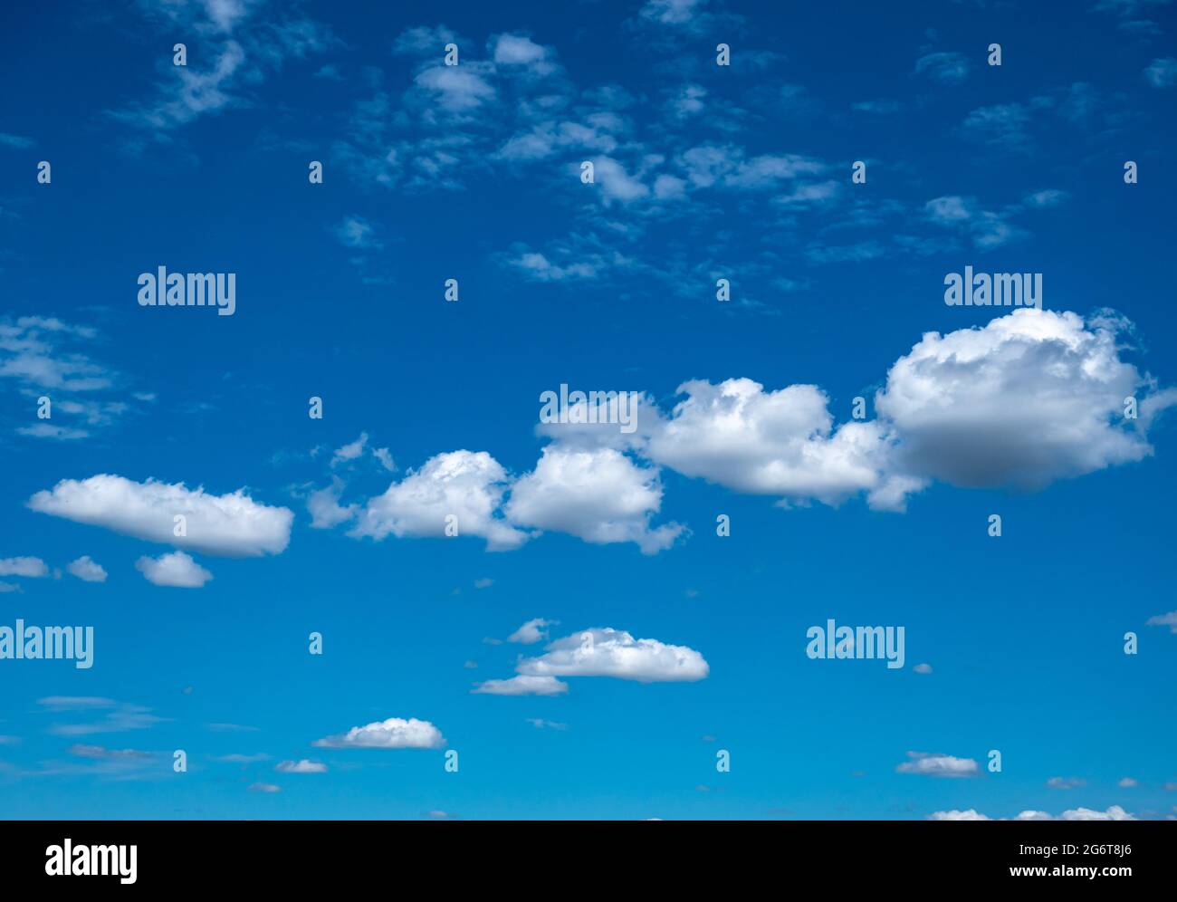 Cloudy landscape on a blue sky Stock Photo