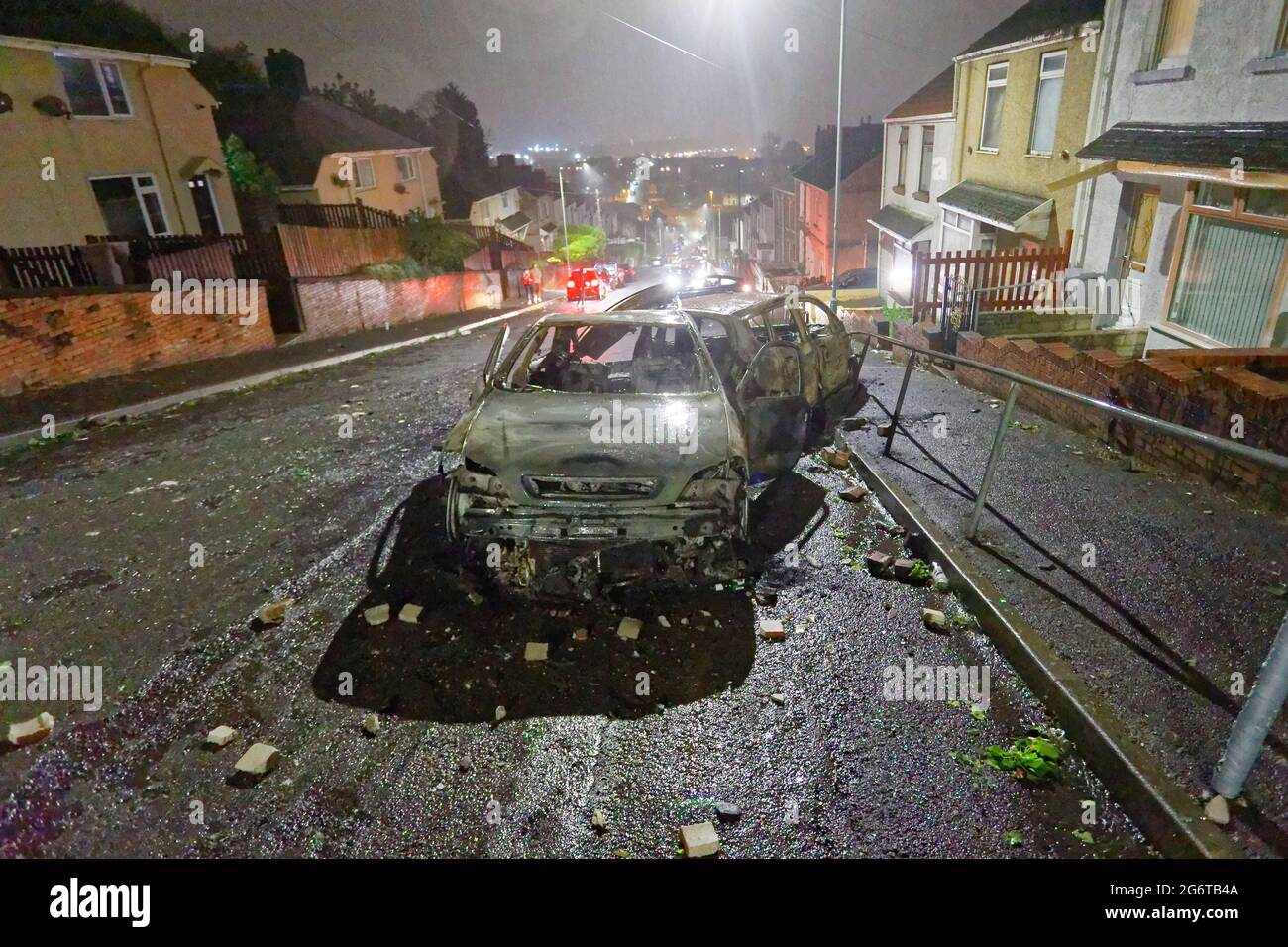 Pictured The burned out cars in WaunWen Road in the Mayhill area of