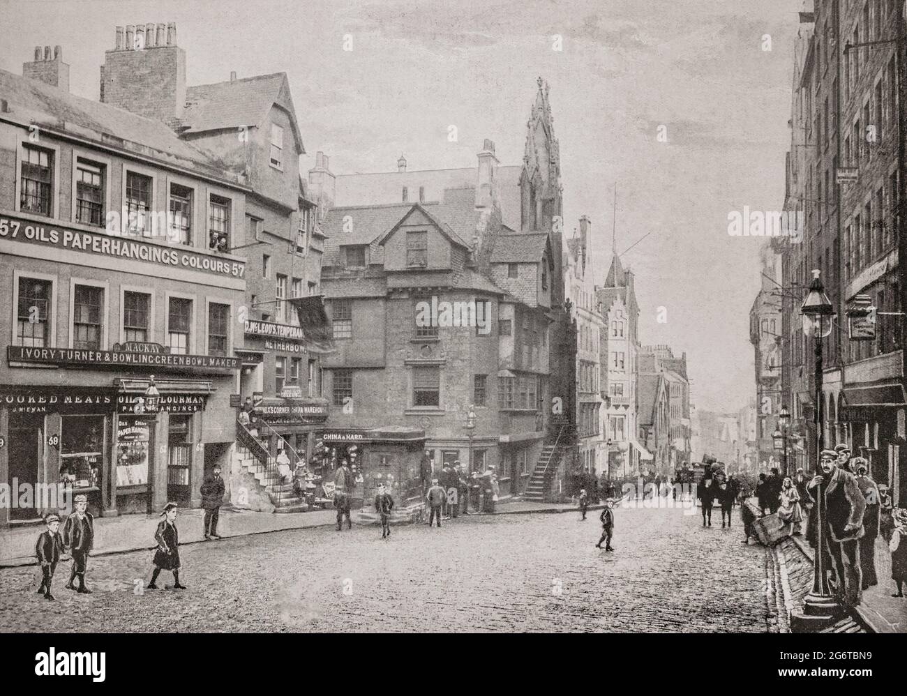 A late 19th century view of High Street in Edinburgh, Scotland, and John Knox's House,reputed to have been owned and lived in by Protestant reformer during the 16th century. Although the house 'was Knox's home only for a few months during the siege of Edinburgh Castle, it is believed that he died here.' It appears to have become widely accepted as 'John Knox's House' from the mid-19th century onwards after Victorian writers like Robert Chambers and Sir Daniel Wilson had repeated the popular tradition of attaching Knox's name to it. Stock Photo