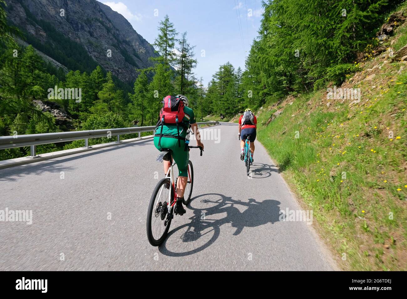 Road cyclist in the canton of Valais, Switzerland. Stock Photo