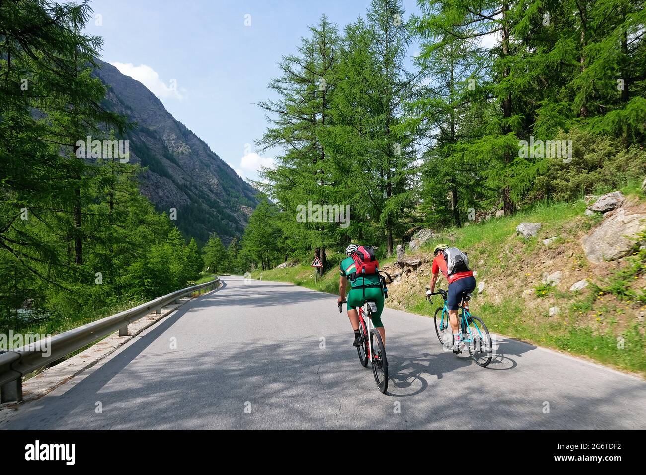 Road cyclist in the canton of Valais, Switzerland. Stock Photo