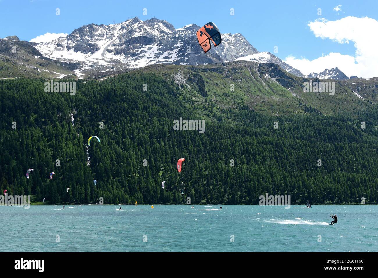Kitesurfers on Lake Silvaplana in the Upper Engadine, Switzerland. Stock Photo