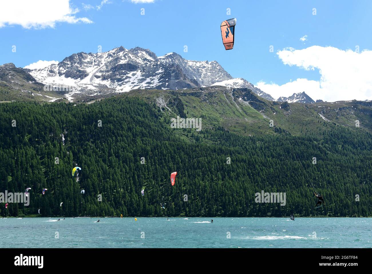 Kitesurfers on Lake Silvaplana in the Upper Engadine, Switzerland. Stock Photo