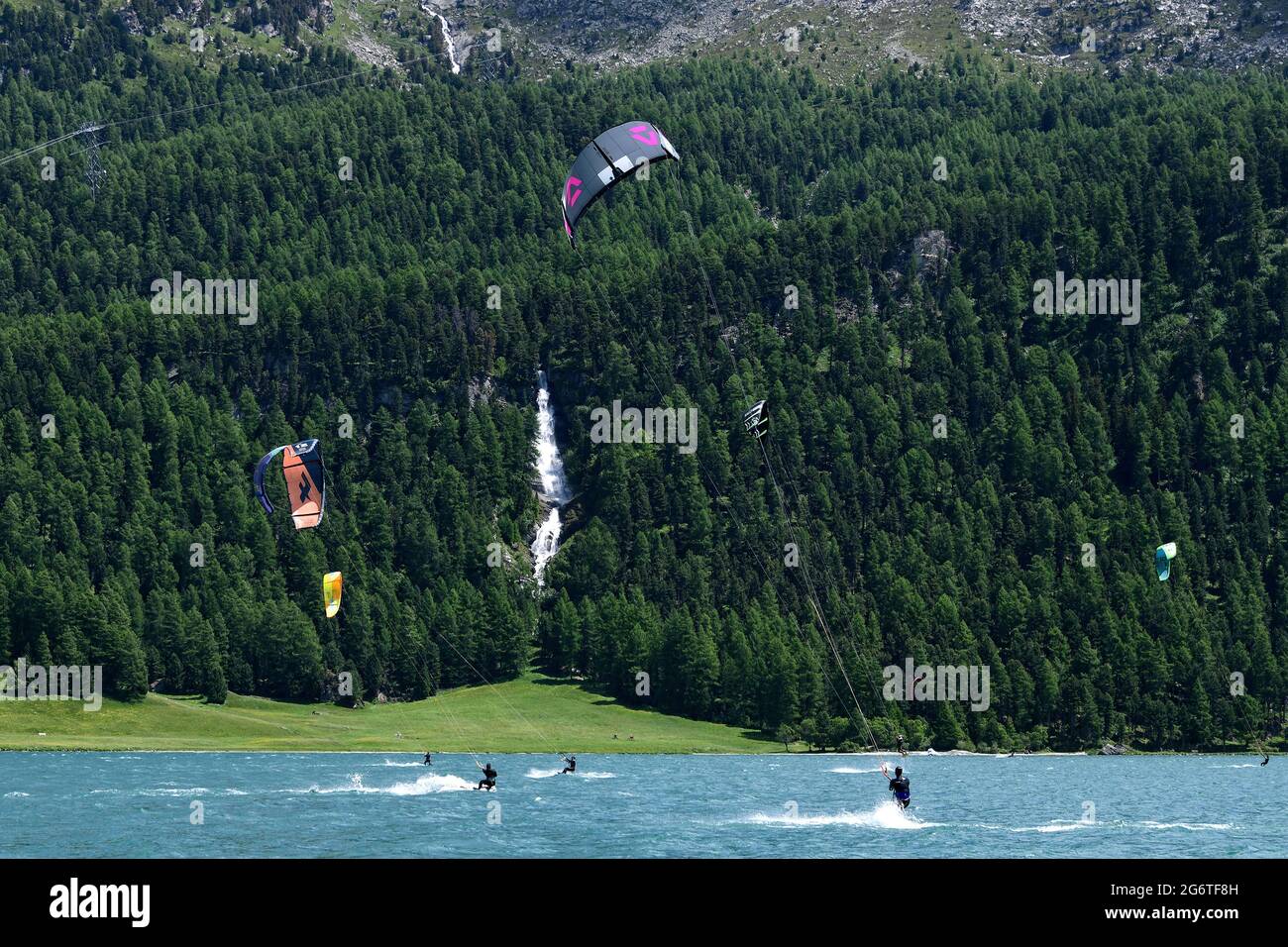 Kitesurfers on Lake Silvaplana in the Upper Engadine, Switzerland. Stock Photo