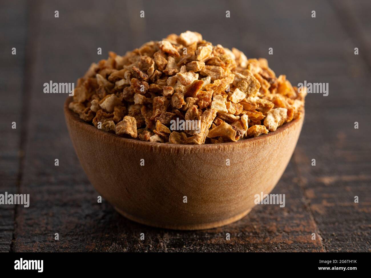 Dehydrated Lemon Peel on a Rustic Wooden Table Stock Photo