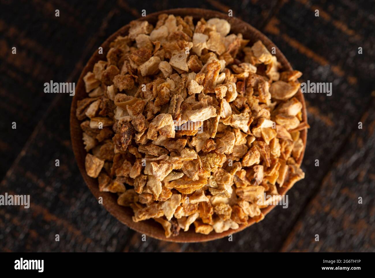 Dehydrated Lemon Peel on a Rustic Wooden Table Stock Photo