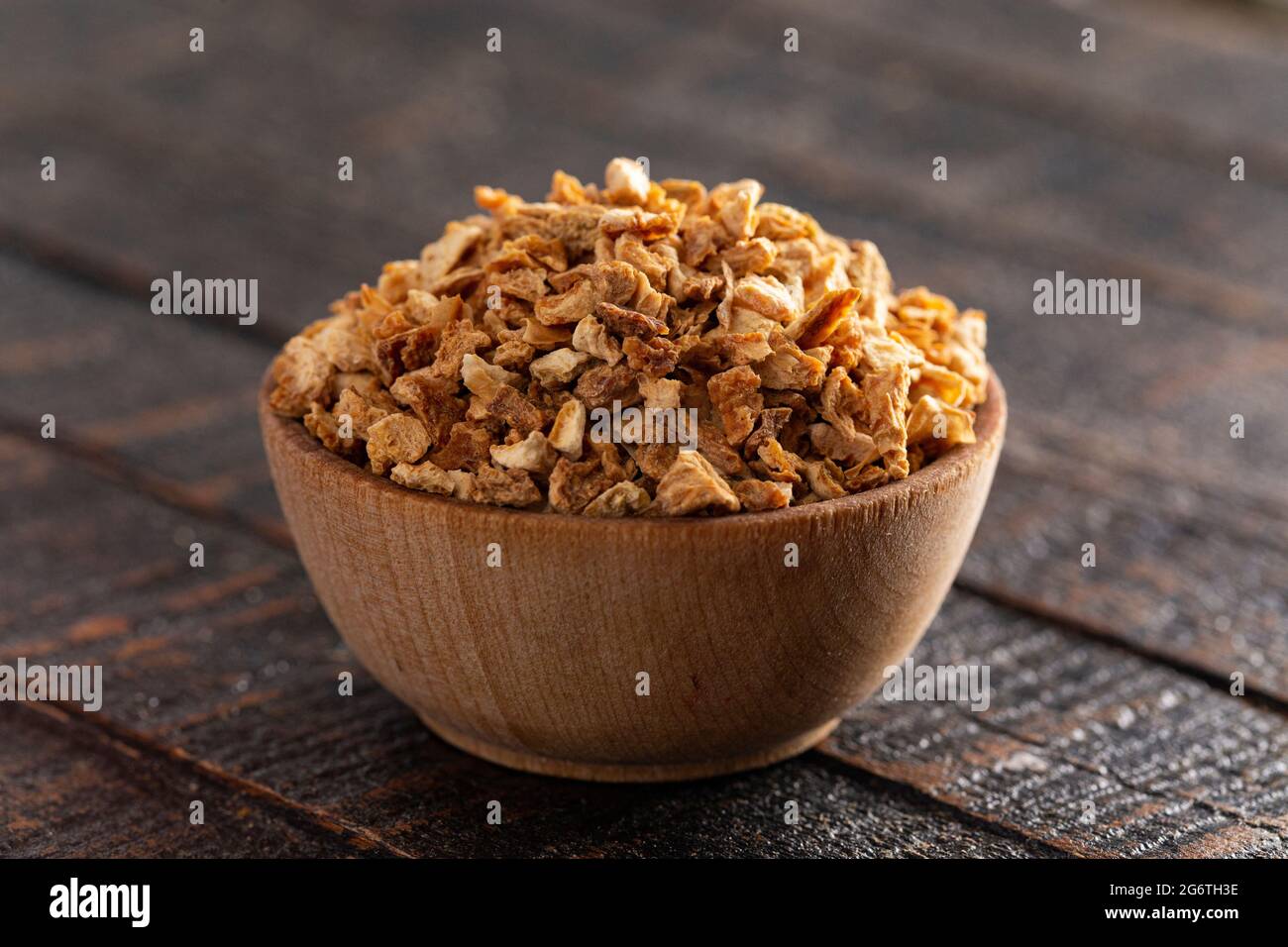 Dehydrated Lemon Peel on a Rustic Wooden Table Stock Photo