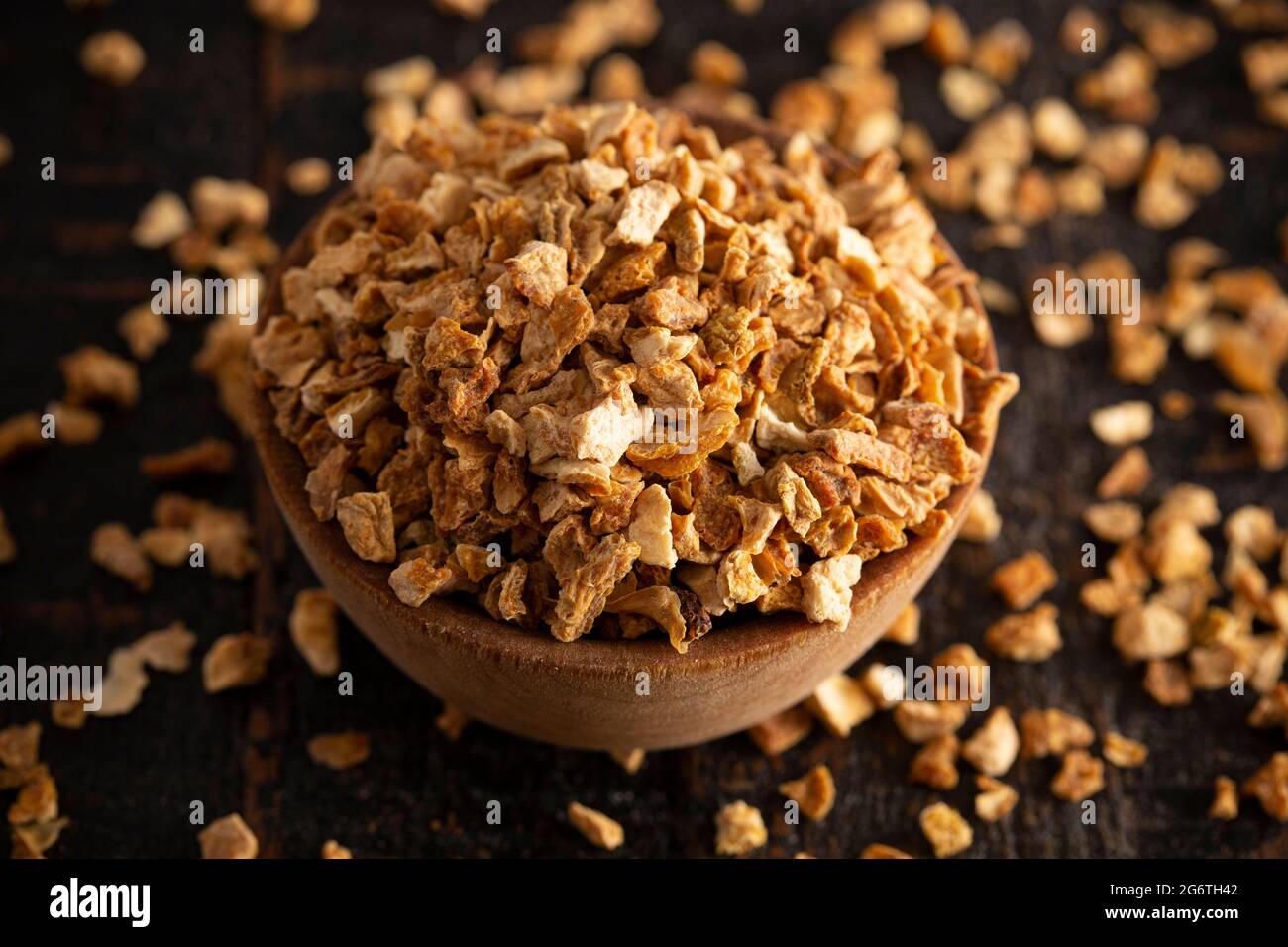 Dehydrated Lemon Peel on a Rustic Wooden Table Stock Photo