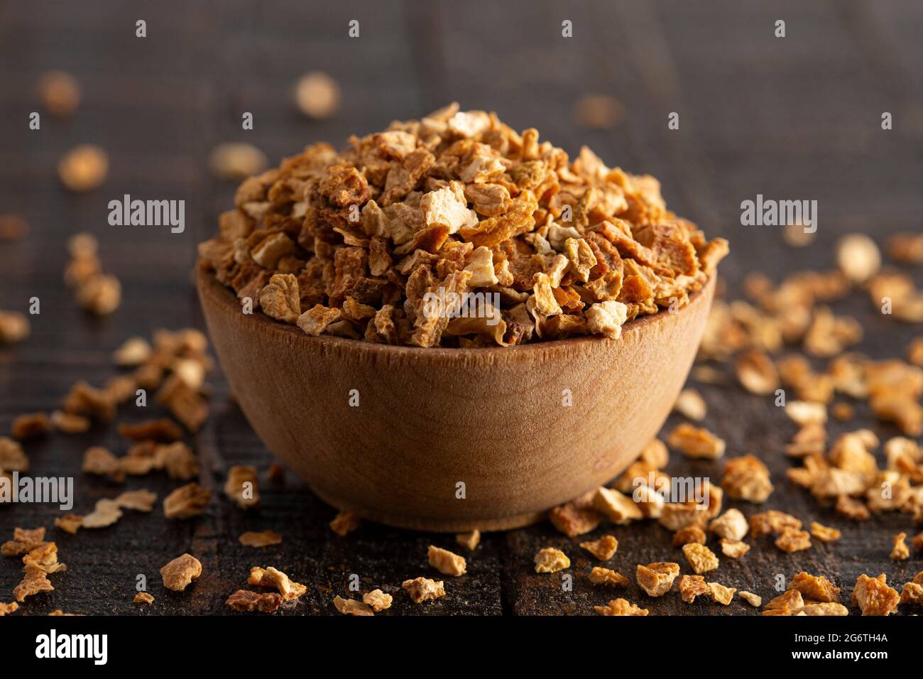 Dehydrated Lemon Peel on a Rustic Wooden Table Stock Photo