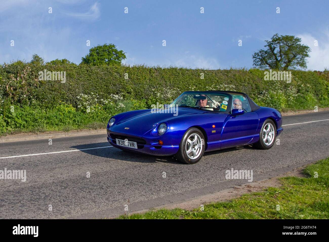 2000 blue TVR 5 speed manual cabrio, 3952 cc petrol 2dr, two seater en-route to Capesthorne Hall classic May car show, Cheshire, UK Stock Photo