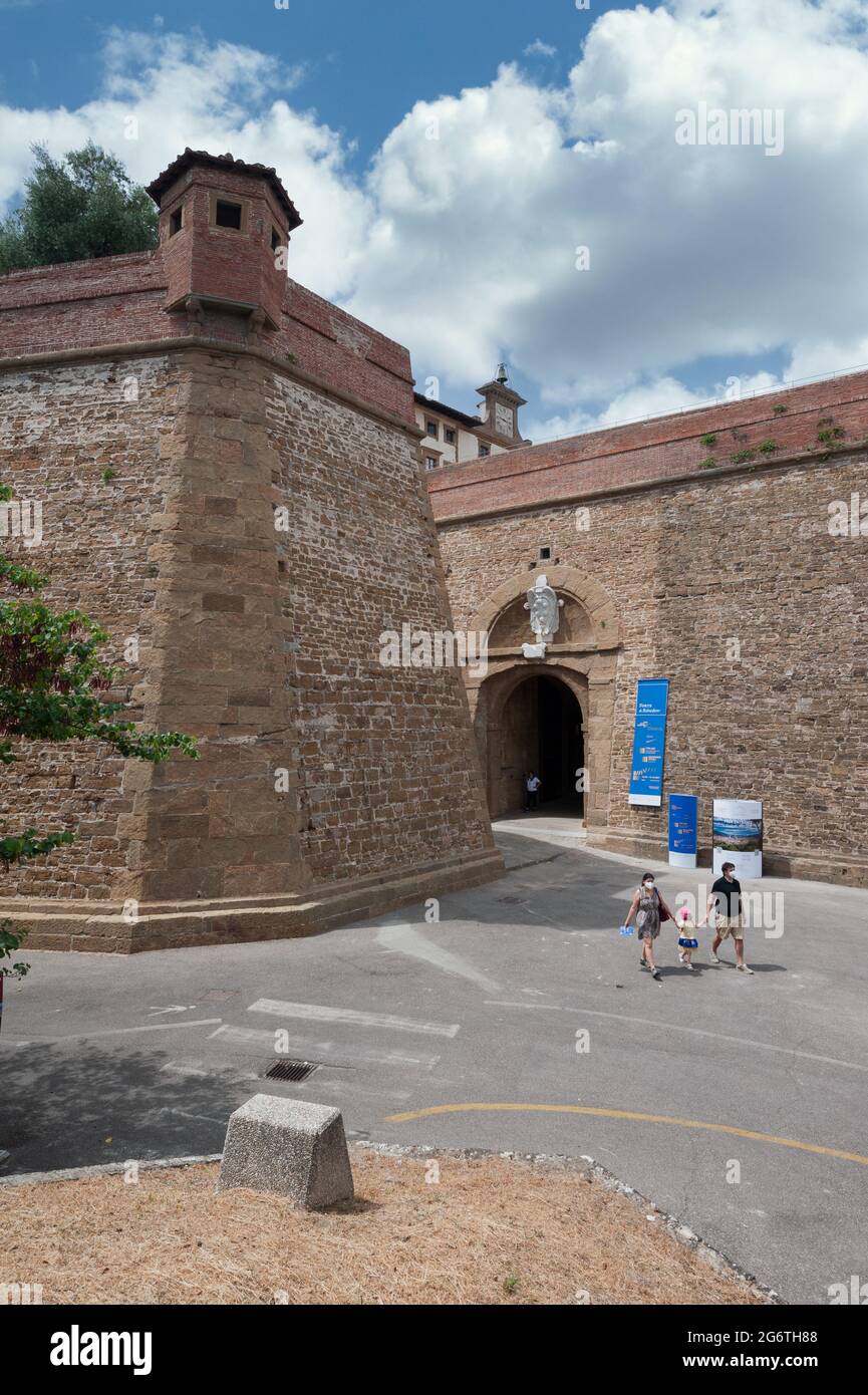 The main entrance of the Fort Belvedere. Tourists walking near the large bastions.. Stock Photo