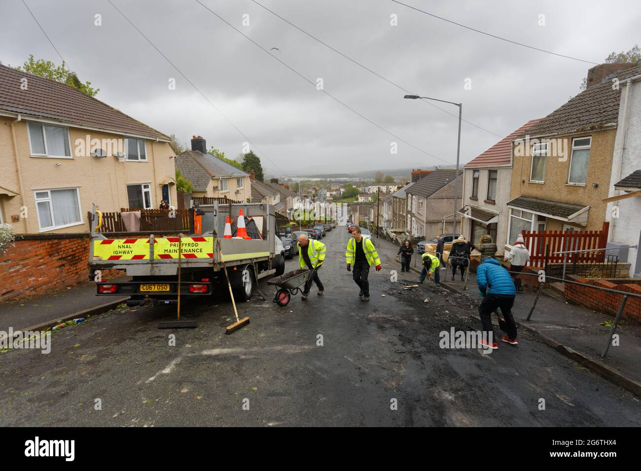 Pictured Locals and Council workers clean up in WaunWen Road in the