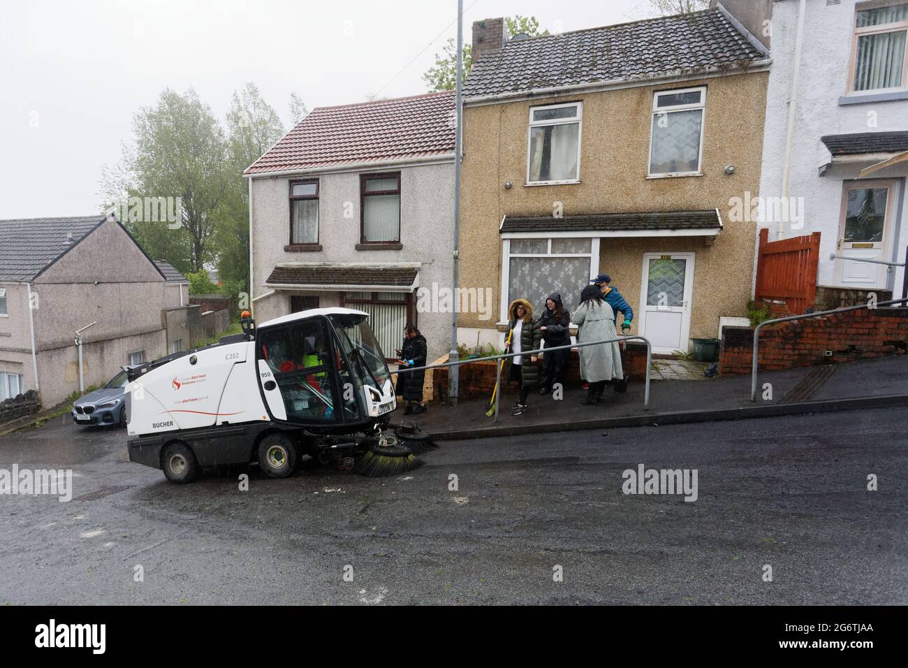 Pictured: A Council brush cleans up in Waun-Wen Road in the Mayhill area of Swansea, Wales, UK. Friday 21 May 2021 Re: Gangs of 'yobs' have been setti Stock Photo