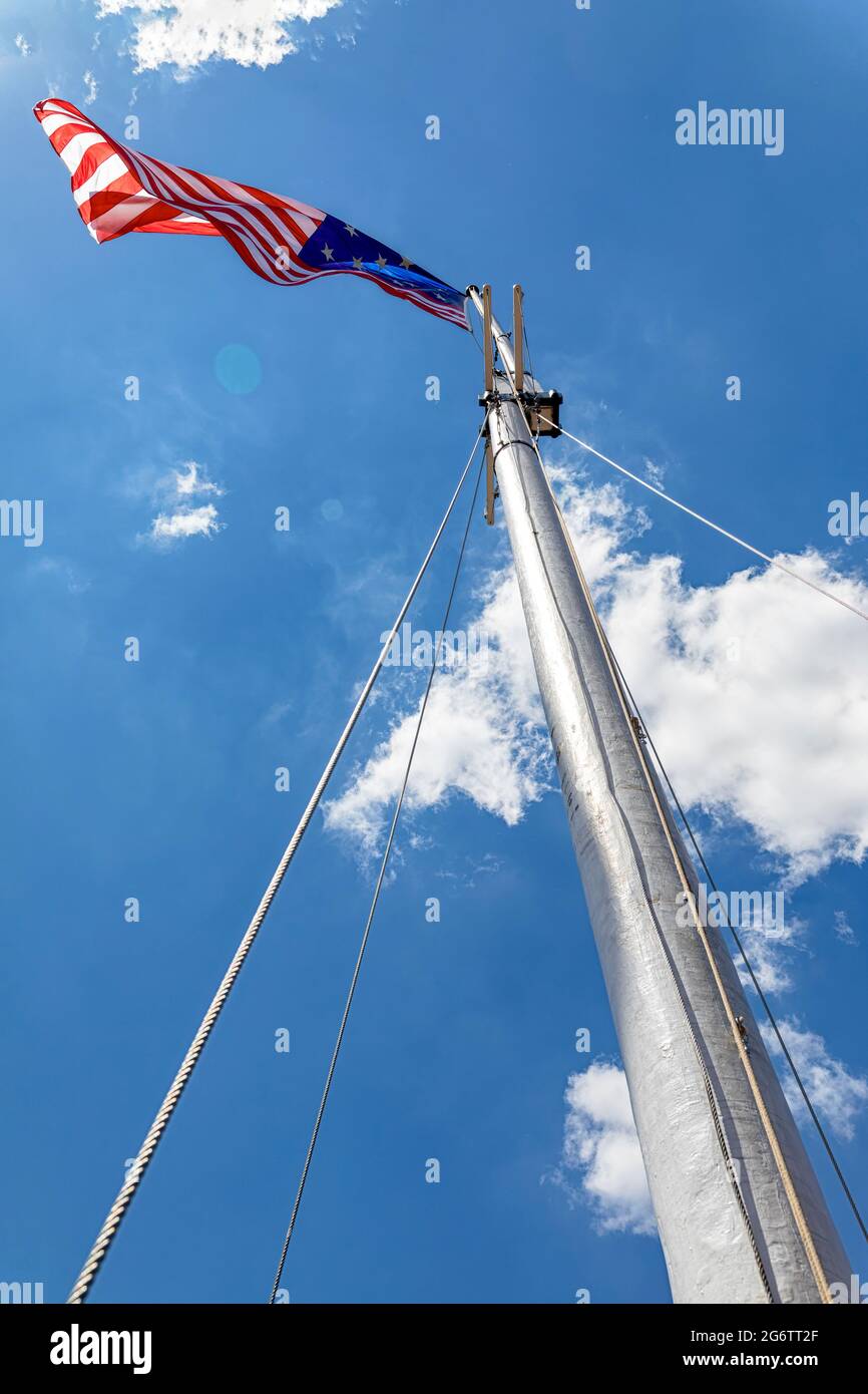 The 15-star/stripe flag of the United States flies over Fort McHenry. This is the 'Star-Spangled Banner' of the U.S. National Anthem. Stock Photo