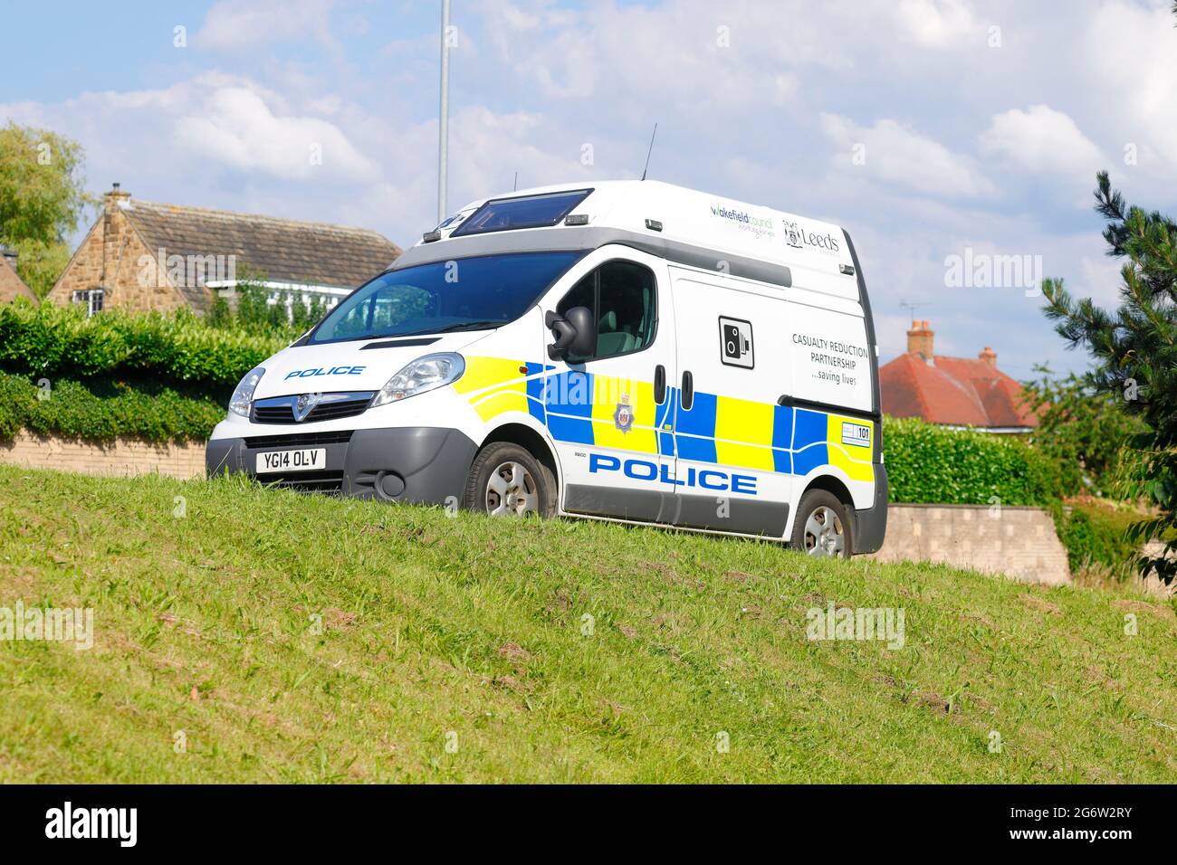 Police mobile speed camera van in operation on Leeds Road in Rothwell,Leeds,West Yorkshire,UK Stock Photo