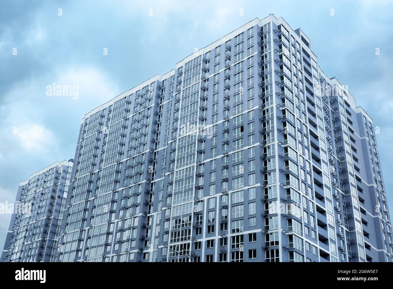 Multistory house. New apartment facade in big building modern flat apartment complex. New house condominium building real estate modern residential Stock Photo