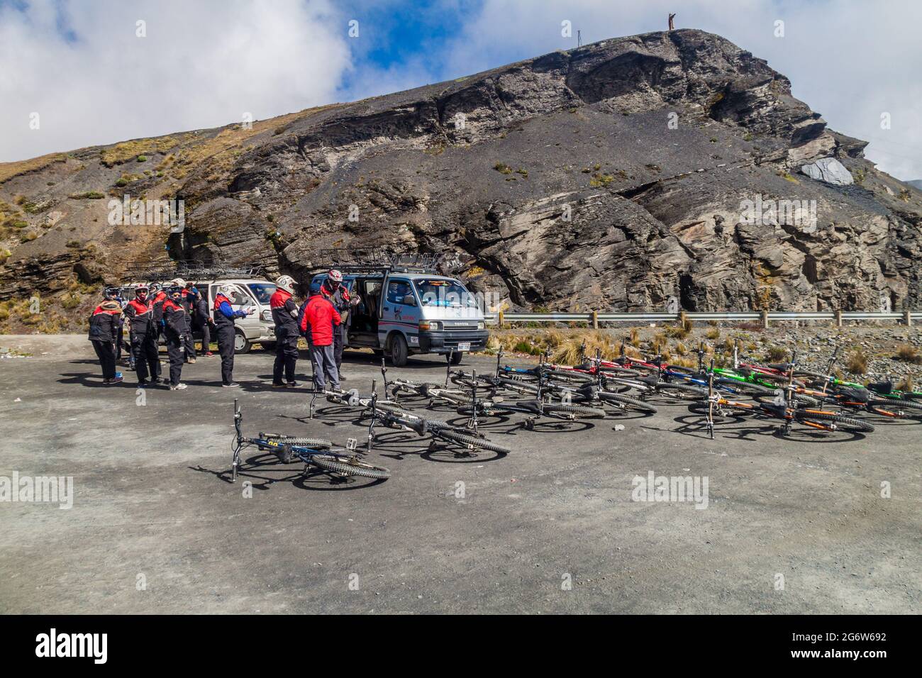 LA CUMBRE, BOLIVIA: APRIL 29, 2015: Bicycles and participants prepared for descent of The World's most dangerous road at La Cumbre pass (altitude 4700 Stock Photo