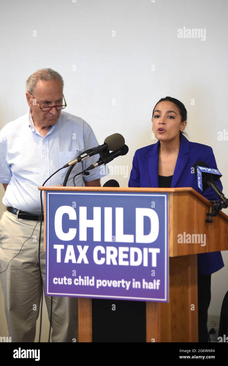 New York, NY, USA. 8th July, 2021. Majority Leader Senator Charles Schumer, Representative Alexandria Ocasio Cortez at the press conference for New York Members of U.S. Congress Hold Press Conference on Child Tax Credit (CTC), Ted Weiss Federal Building, New York, NY July 8, 2021. Credit: Kristin Callahan/Everett Collection/Alamy Live News Stock Photo