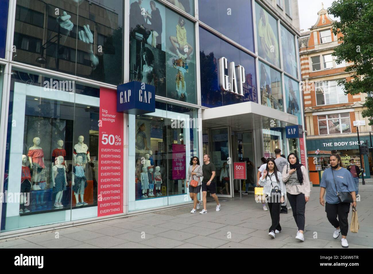 London, UK, 8 July 2021: Clothes are being sold at heavy discounts at this branch of Gap on London's Oxford Street. All 81 UK and Irish branches of the San Francisco based fashion chain will be closed in Late August or September but an online presence will be maintained. It is estimated that over 1000 jobs will be lost. Anna Watson/Alamy Live News Stock Photo
