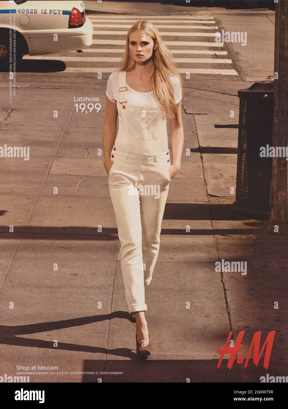 poster advertising H&M with Lara Stone in paper magazine from 2015 year, advertisement, creative Hennes & Mauritz advert from 2010s Stock Photo