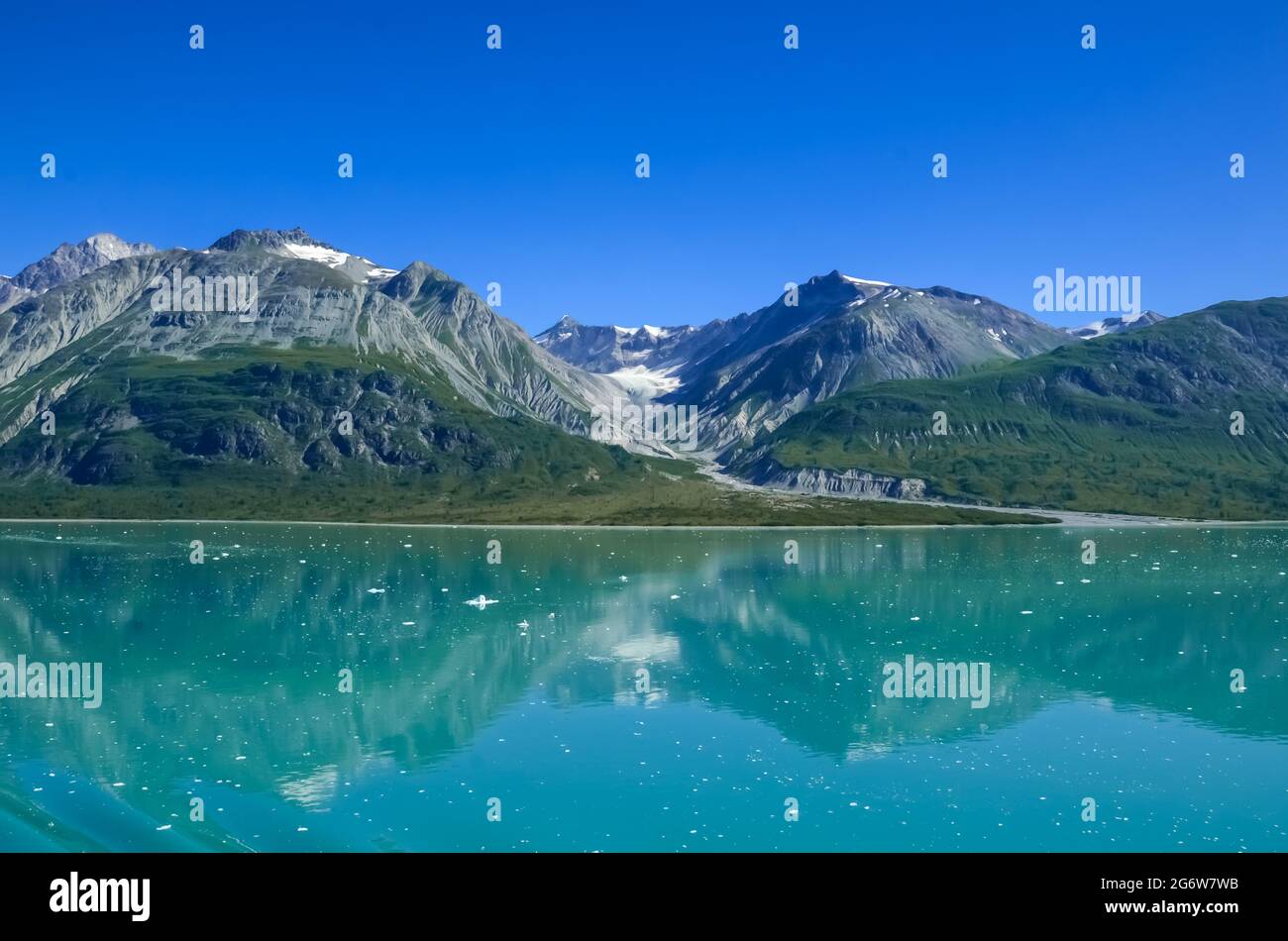 Alaska landscape mountains and water and blue sky. Mountains reflection in the water. Remote location, unplugged. Wild beauty in nature. environment Stock Photo - Alamy