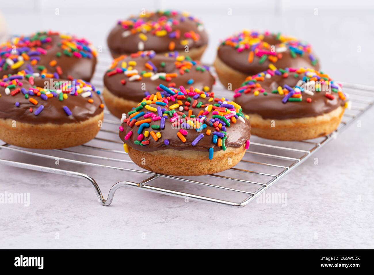 Chocolate donut rainbow sprinkles hires stock photography and images