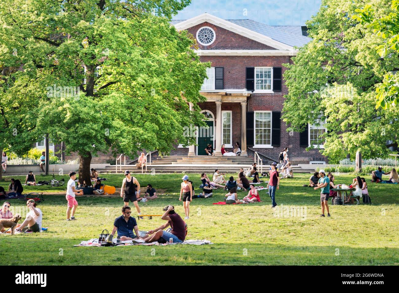 TORONTO, CANADA - 06 05 2021: Torontonians enjoying sunny weather and lifting of stay at home order in the Grange Park in downtown Toronto with Art Stock Photo
