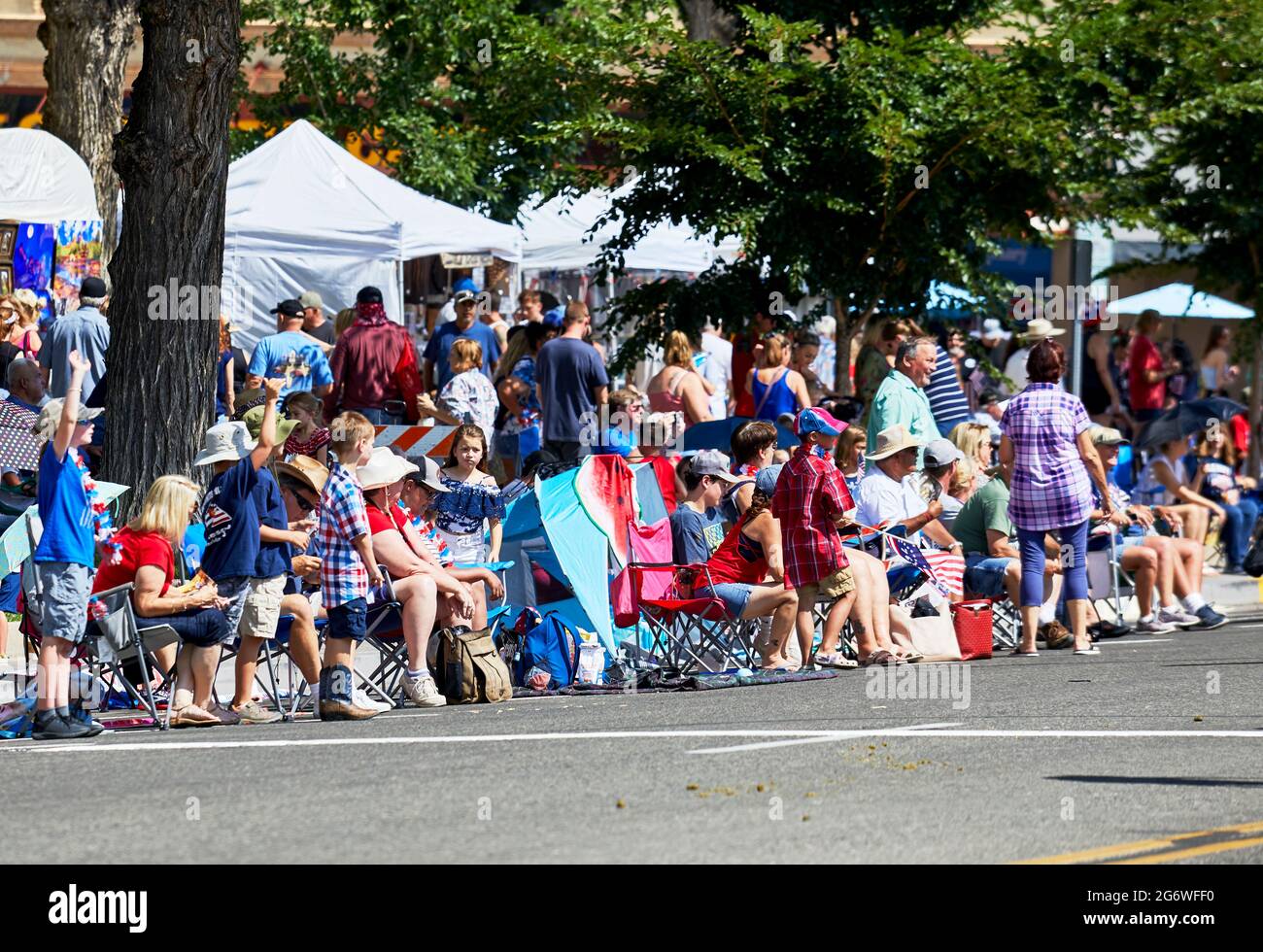 Prescott, Arizona, USA - July 3, 2021: Large crowd of spectators waiting for the 4th of July parade Stock Photo
