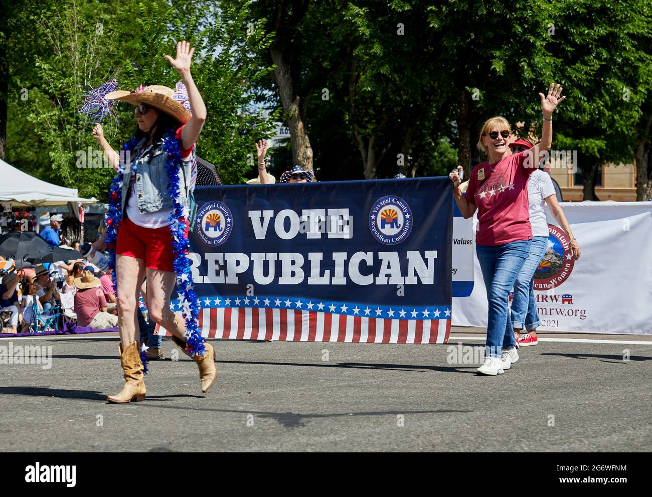 Prescott, Arizona, USA - July 3, 2021: Yavapai County republican party hoding a banner and marching in 4th of July parade Stock Photo