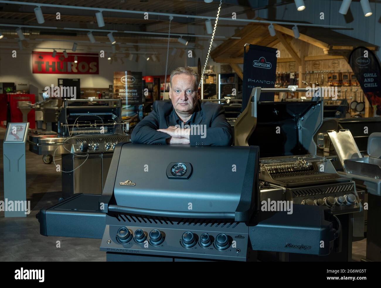 Bad Hersfeld, Germany. 30th June, 2021. Joachim Weber, managing director of  "Grillfürst" GmbH, one of the largest barbecue retailers in Germany, stands  in the company's headquarters. (to dpa "With steaks and corn