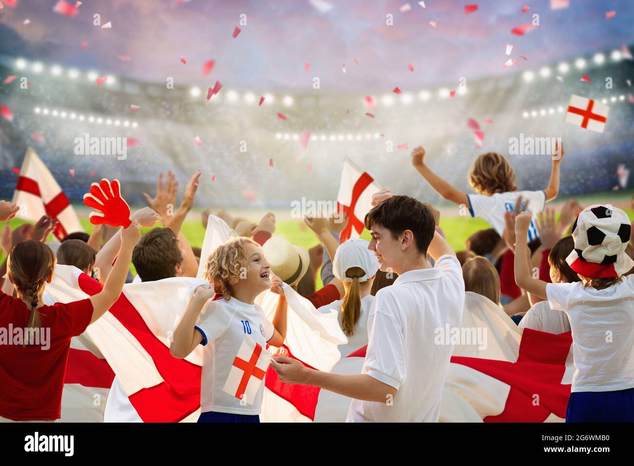 England football supporter on stadium. English fans on pitch team play. Group of British supporters with flag and jersey Stock Photo - Alamy