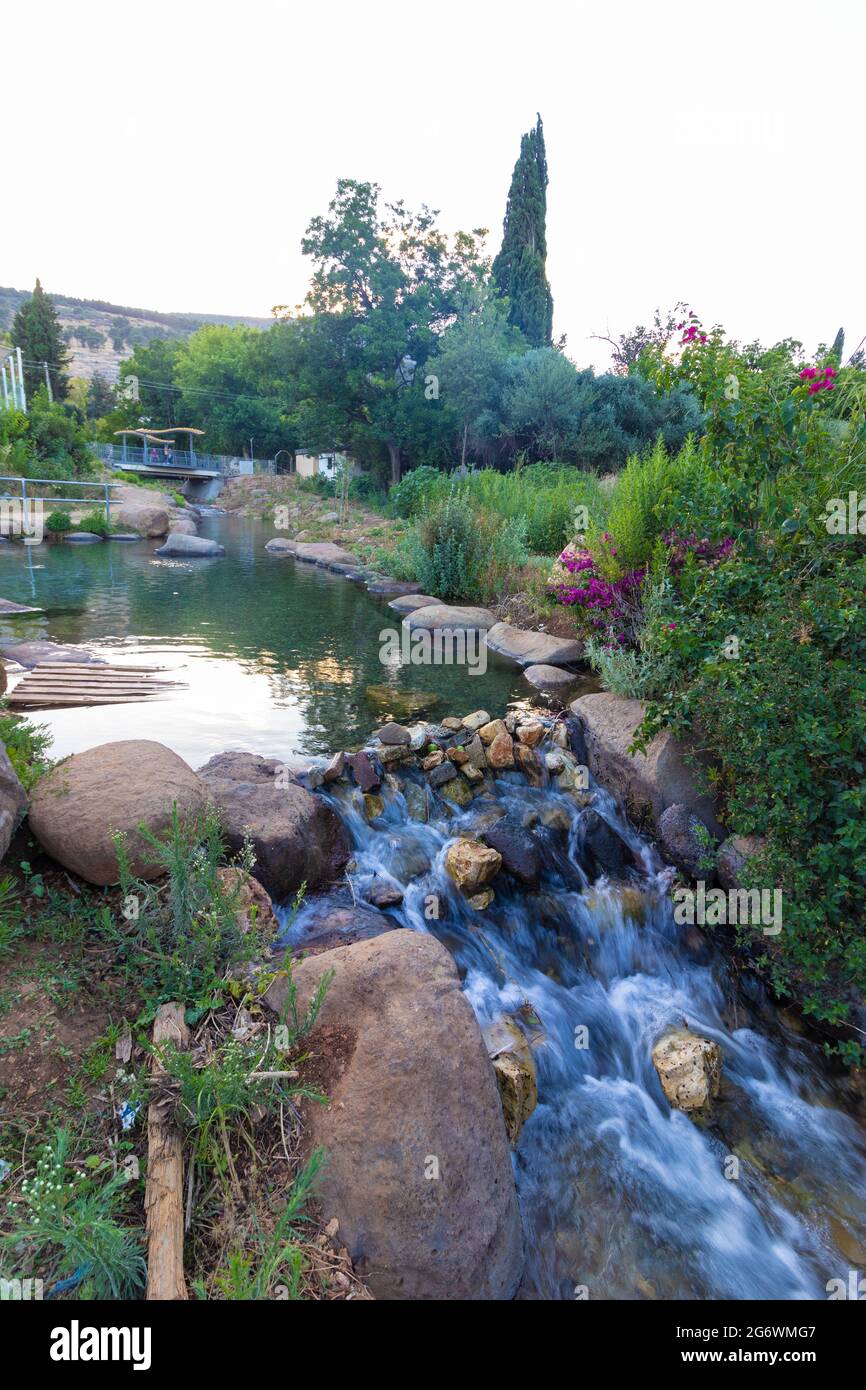 Clear water flows in small waterfall in the Kurdish spring in the ...