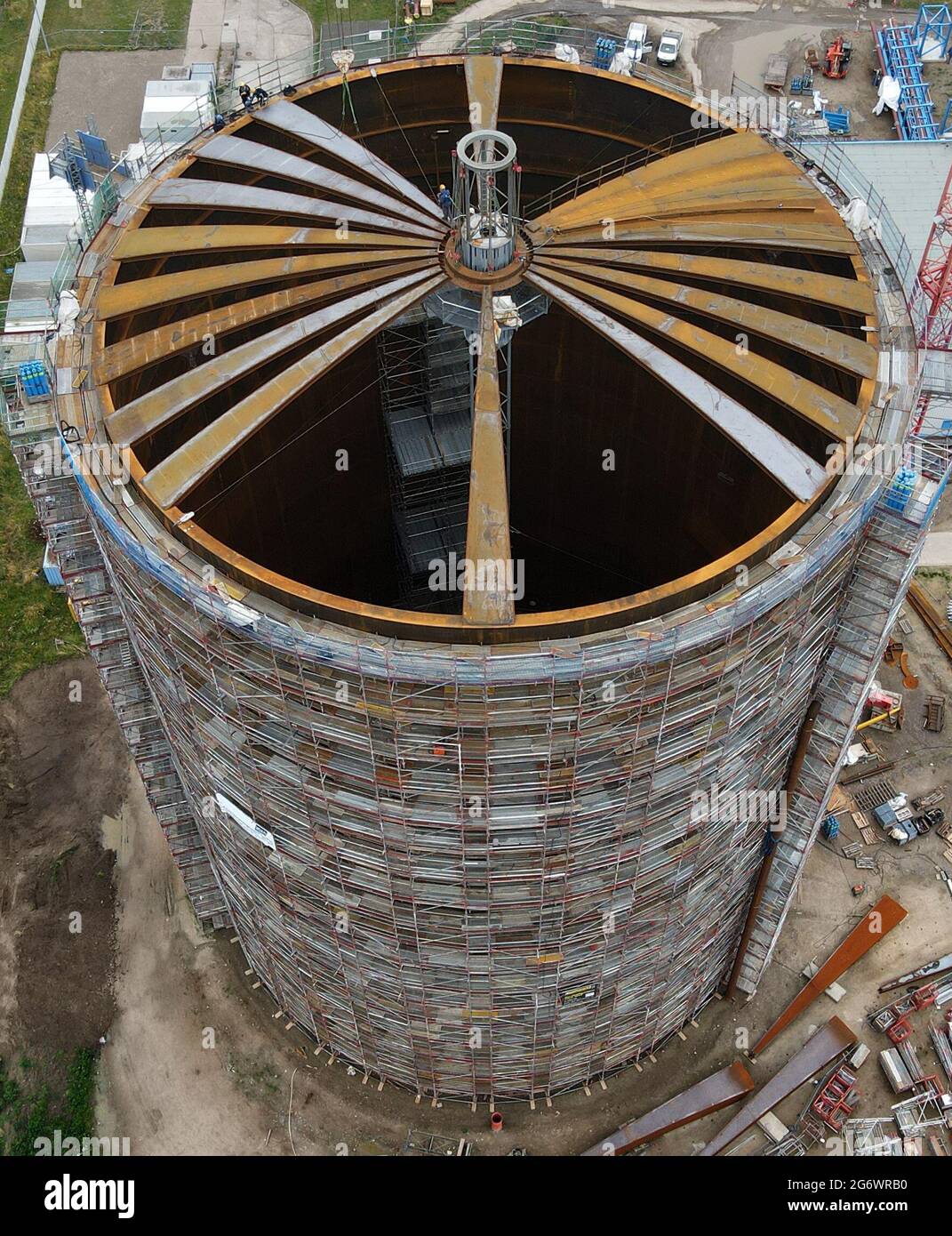 Rostock, Germany. 07th July, 2021. A pressureless hot water storage tank is  under construction on the premises of Stadtwerke Rostock. The storage tank  is 94 meters high in total, 56 meters are