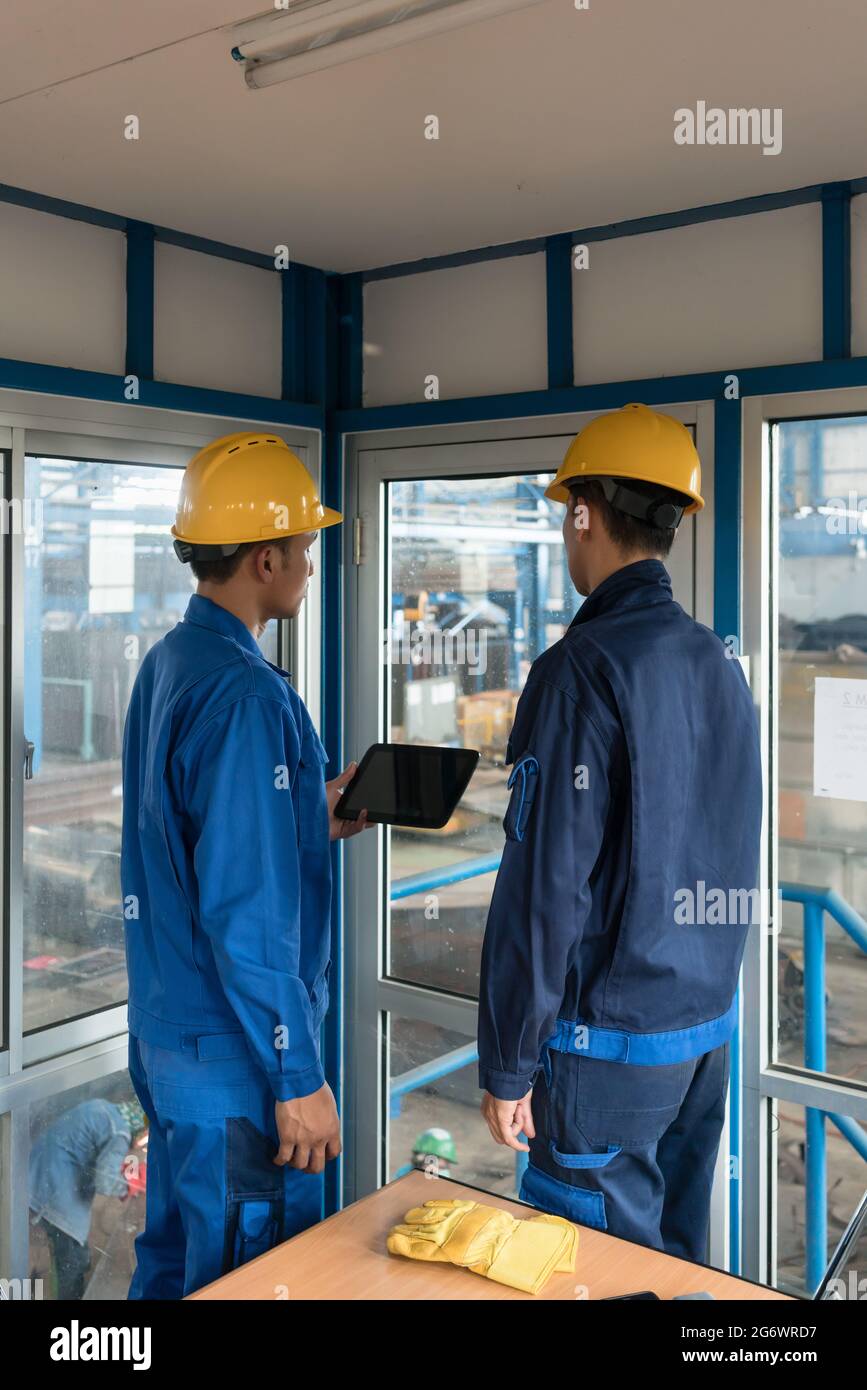 Two men wearing hats standing hi-res stock photography and images - Alamy