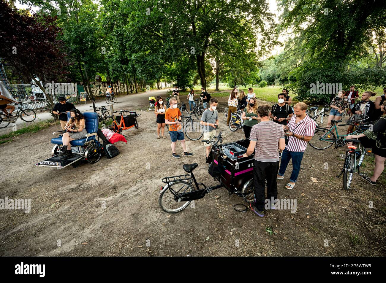 Berlin, Germany. 04th July, 2021. Hayco Baag, organizer and initiator of  the bicycle concerts, prepares his cargo bike, which has been converted  into a concert stage, for the concert. At the concert,
