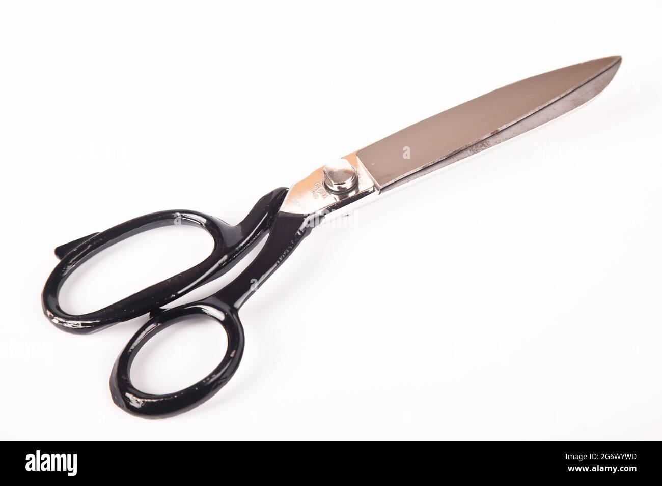 Very sharp retro professional tailor scissors, isolated on white background Stock Photo